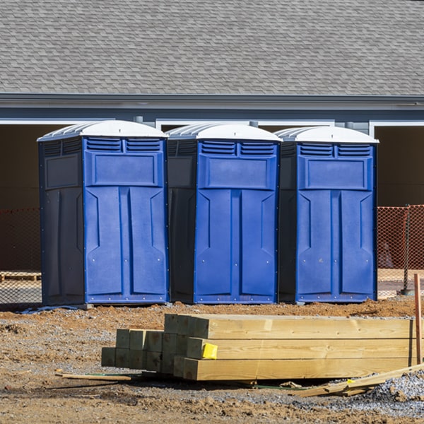 how often are the portable restrooms cleaned and serviced during a rental period in Essex MI